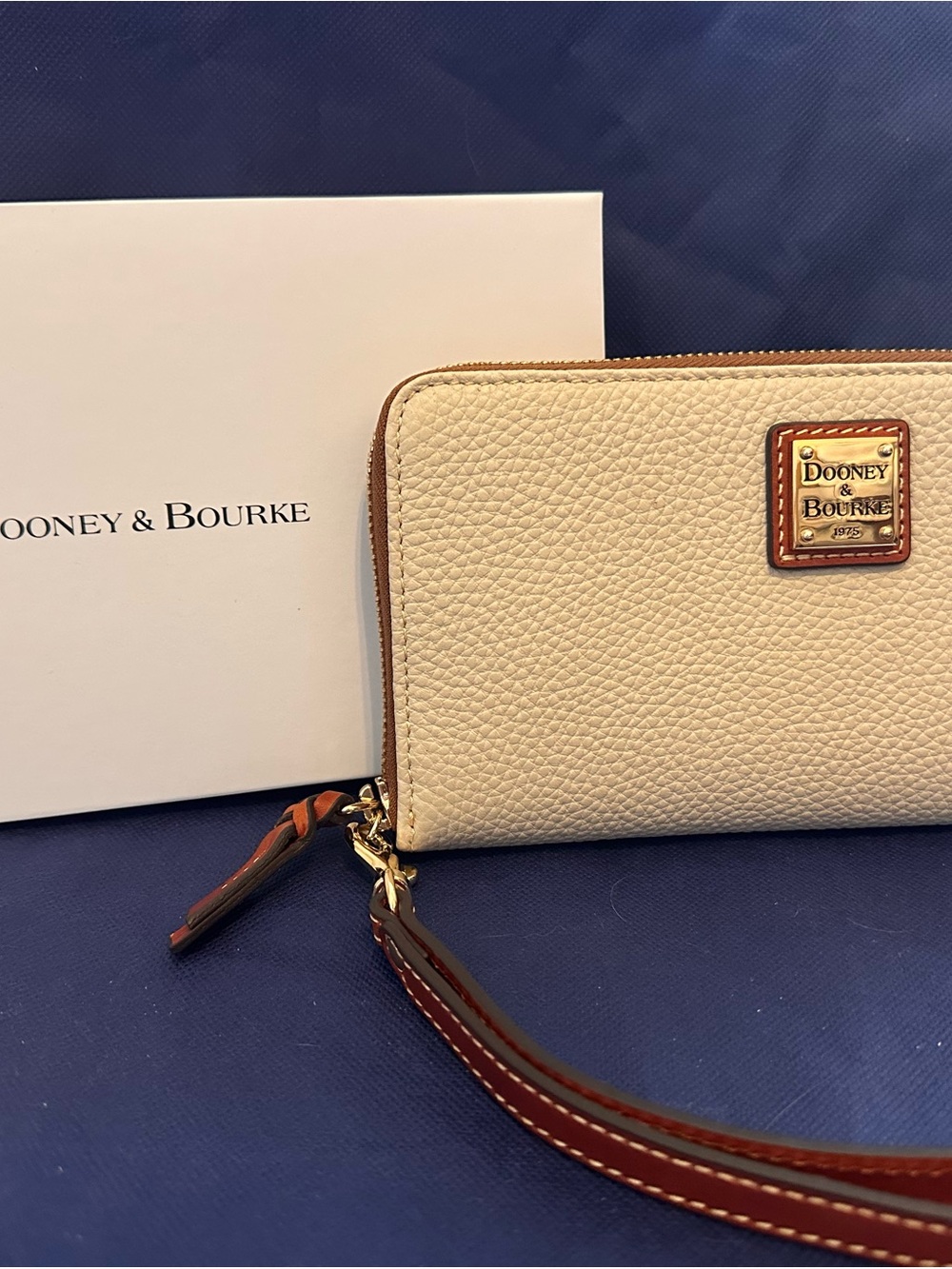 Dooney & Bourke Cream Pebbled Leather Wristlet with Brown Trim